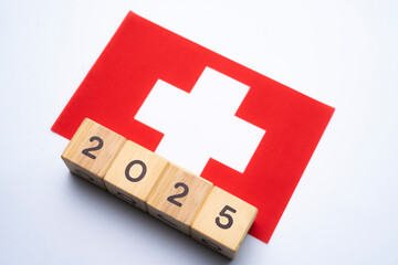 2025, Switzerland flag with date block, Concept, Important events for Switzerland the new year, election, economy, social activities, central bank, Switzerland foreign policy
