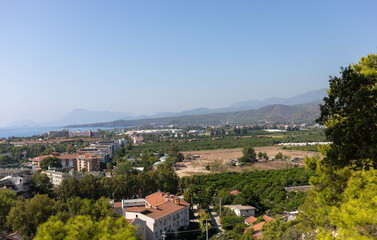 Kirish, Turkey - August 31, 2021 Scenic view of coastal landscape with mountains, urban development