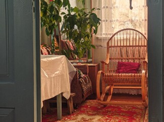 two chairs in front of a house