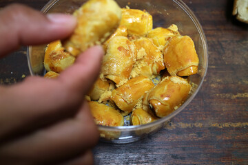 Golden Brown Pastries in a Clear Container