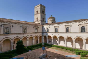 The inner courtyard of a medieval Benedictine abbey in Montescaglioso, Italy.