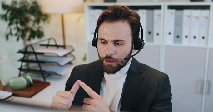 Headset, man and virtual assistant in office with communication, contact or crm networking. Mic, professional and male receptionist on video call for appointment schedule, customer service or query