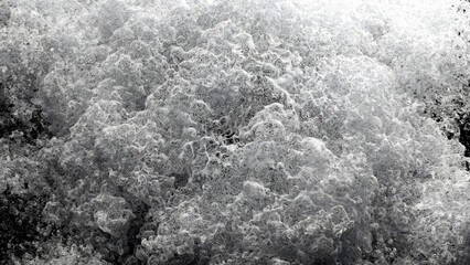 3d render of art, black and white monochrome, surreal video with abstract liquid substance in explosion process based on small dust balls spheres particles with plastic material on black background