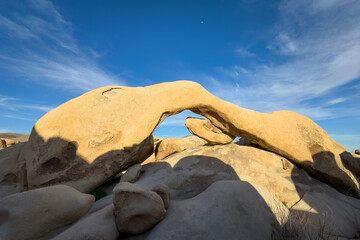 Scenic view of famous Arch Rock formation at Joshua Tree National Park, California, United States...