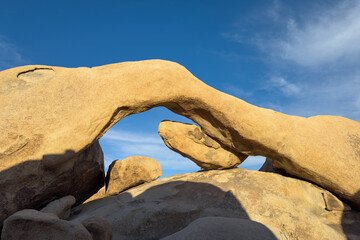 Scenic view of famous Arch Rock formation at Joshua Tree National Park, California, United States...