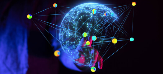 Hand interacting with a digital globe, showcasing global network connections and data visualization.