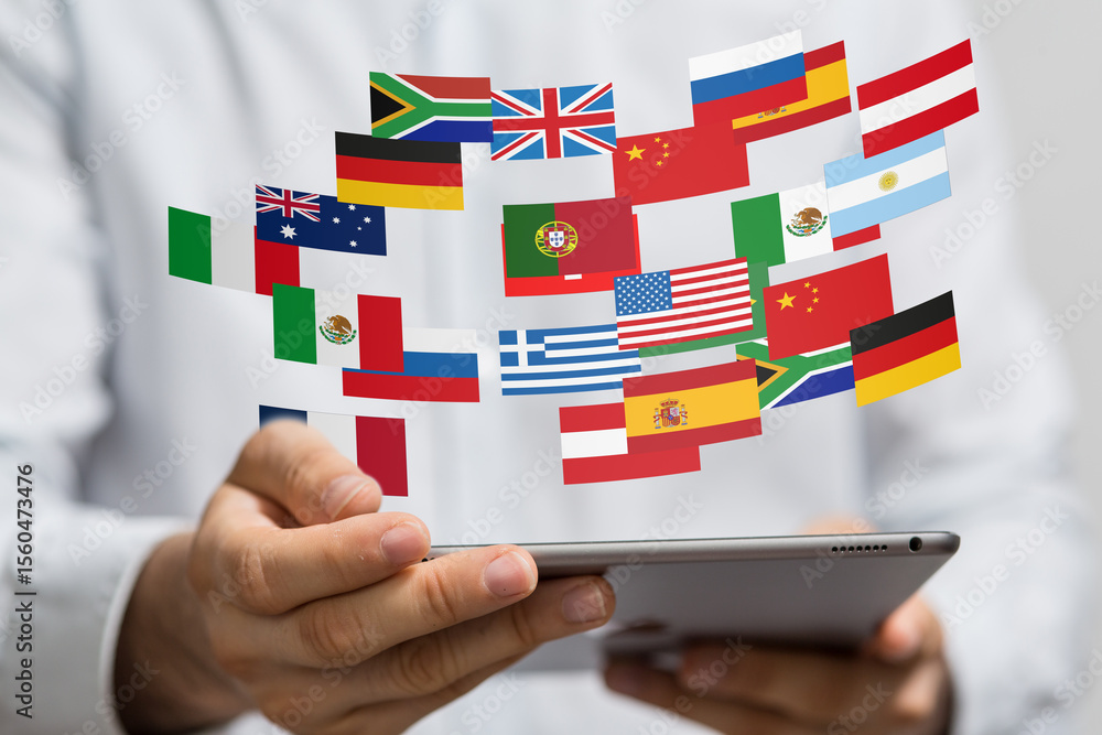 Poster person using tablet displaying flags of various countries, representing international communication 