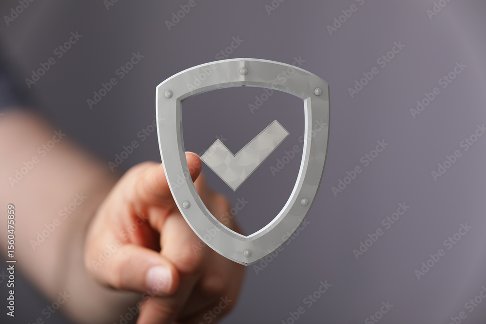 Poster Image of a hand selecting a digital shield icon, representing data security and protection.