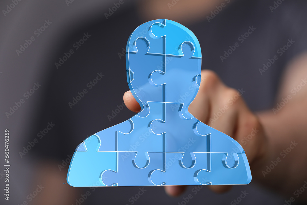 Poster abstract image of a person made of puzzle pieces, symbolizing teamwork and collaboration.