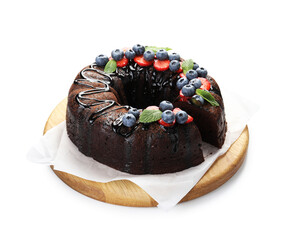 Delicious chocolate bundt cake with strawberries, mint and blueberries isolated on white
