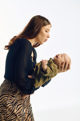 Joyful moments shared between a young mother and her baby create lasting bonds of love