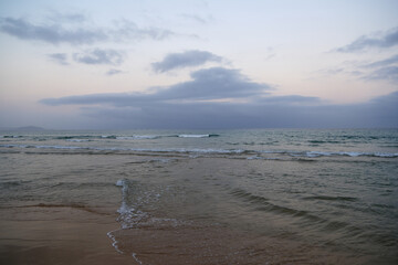 evening beach, sea waves on the shore at Sanya, Hainan, China