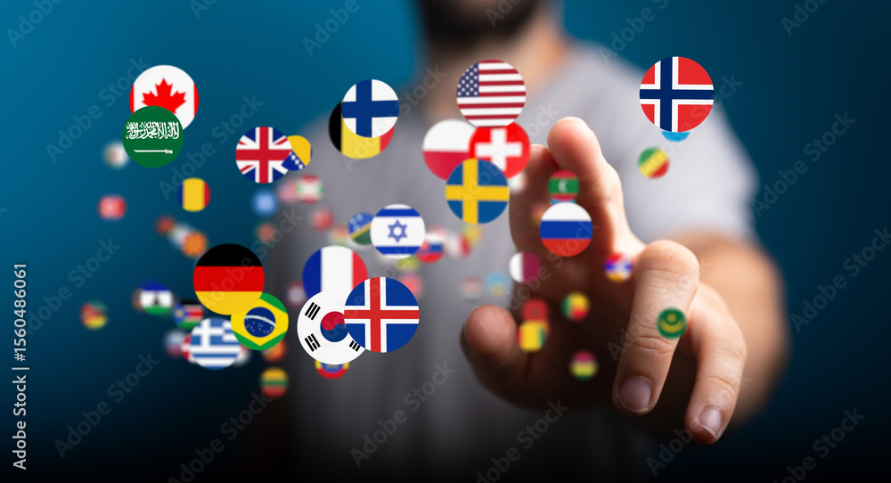 Poster A man interacts with a digital display of world flags, symbolizing global communication and connection.