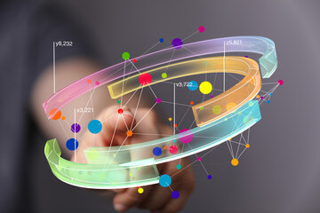 Abstract image of a hand interacting with a vibrant 3D data visualization, showcasing complex...