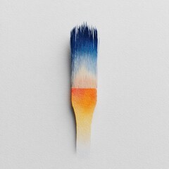 A paintbrush with a gradient handle and bristles