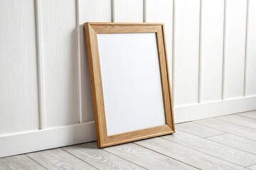Realistic wooden poster frame mockup on white wall background in minimal interior room. Ideal for design showcase, art presentation, home decor, or modern gallery display.