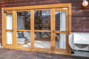 Moving white cloth curtains in winter morning with windows and door in cozy house