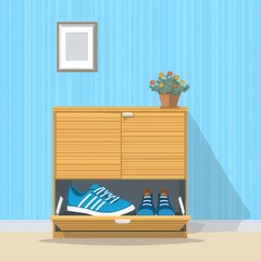 Light wood shoe cabinet with blue sneakers.