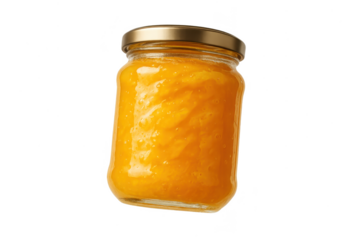 Vibrant yellow fruit jam in a glass jar, isolated on transparent background
