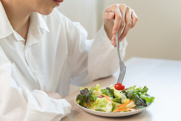 person on diet session feel bored vegetarian meal like salad.