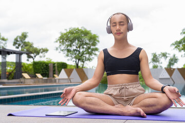 non binary gay man doing yoga exercise