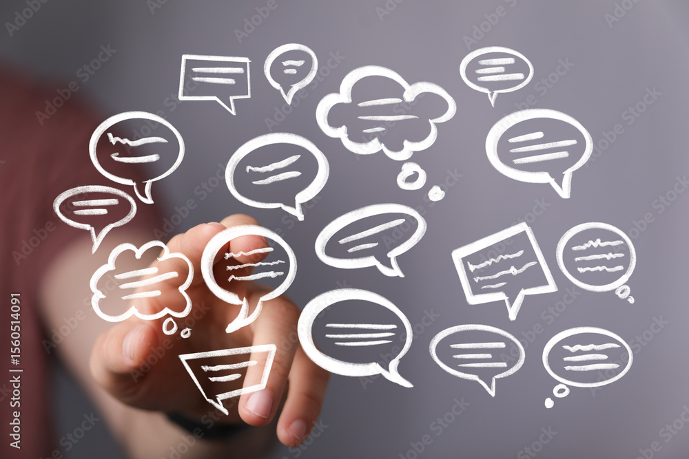 Poster Abstract image of hand interacting with speech bubbles, symbolizing communication and ideas.