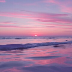 Fototapeta premium Stunning pink and purple sunset over a calm ocean beach. Soft waves reflect the colorful sky, creating a tranquil and dreamy seascape—ideal for travel themes, nature art, and peaceful backgrounds.