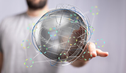 Abstract image of a person interacting with a futuristic digital globe hologram.