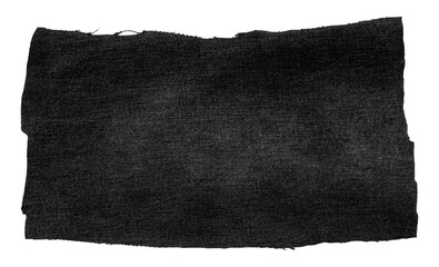Piece of black torn denim on a white background. Denim texture