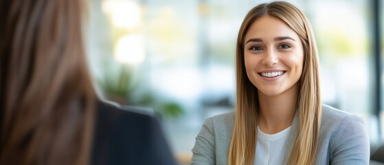 Confident female consultant offering premium services to customer in high end showroom featuring stylish modern decor and sophisticated professional consultation environment