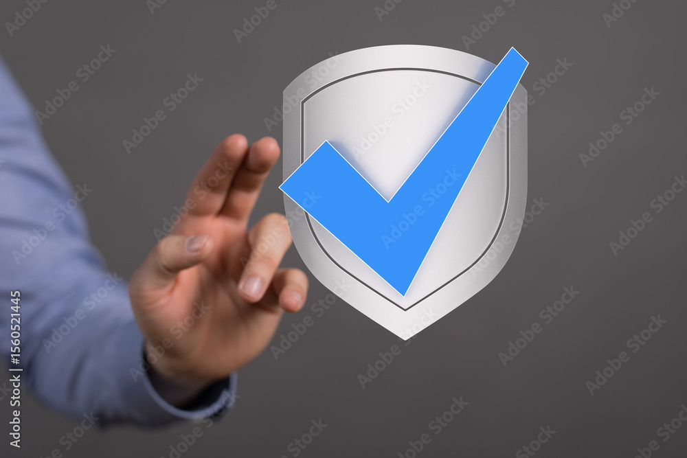 Poster hand reaching for a digital shield with a checkmark, symbolizing data security and approval.