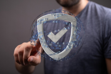 Secure your digital assets.  This image depicts a shield representing online protection and data...