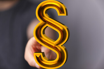 High-quality 3D render of a golden paragraph symbol. Perfect for legal, law, and justice concepts.