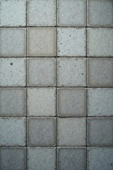 Obraz premium Gray geometric square mosaic cement tile texture subtle vintage effect , rough, decoration