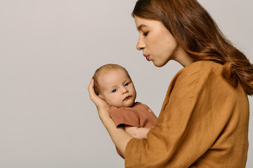 Joyful moments shared between a young mother and her adorable child in a warm and inviting setting
