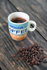 cup of coffee with beans