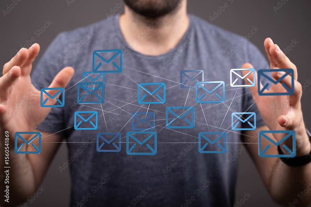 Poster man interacts with a network of email icons, symbolizing global communication and connection.