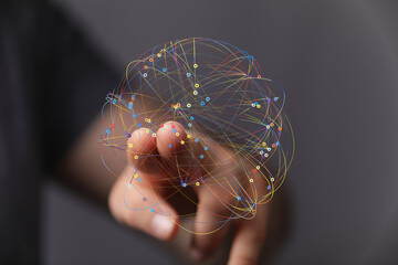 Hand interacting with a digital network.  Represents connection, technology, and global...