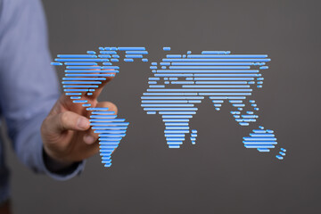 Hand interacting with a digital world map, illustrating global connectivity and networking.