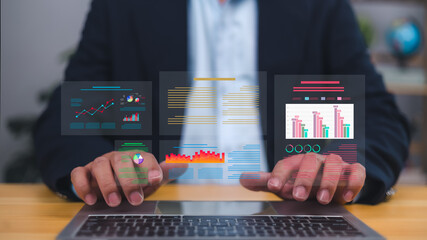 Businessman interacting with a futuristic virtual data analytics dashboard on a laptop, Key performance indicators, charts, business reports for strategic planning, decision making, growth insights.