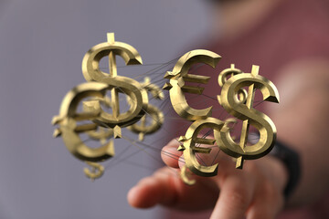 3D rendering of interconnected dollar and euro symbols, representing global finance and currency...