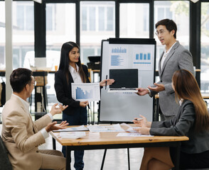 Business Meeting and Presentation: A dynamic business presentation is underway, with the team...