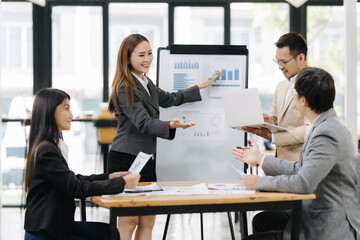 Business presentation: A dynamic presentation by professional business team in a modern office,...