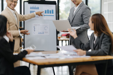Business Presentation: Professionals in a collaborative work environment. Discussing data analysis...
