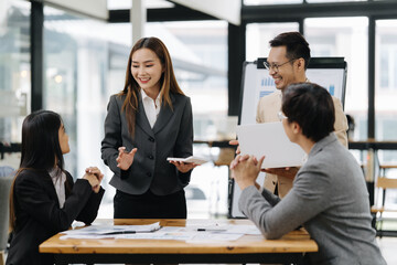 Business Team in Meeting: Capture the dynamic of collaboration and success within a modern office...