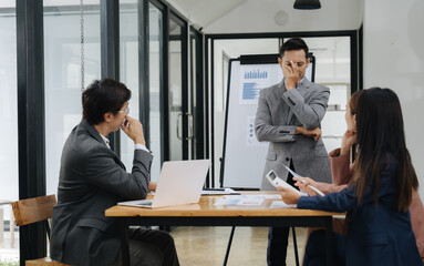 Business Meeting Challenge: A serious business meeting unfolds, with team members deeply engrossed...