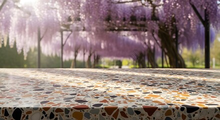 Stunning View of a Terrazzo Table Under a Wisteria Arbor