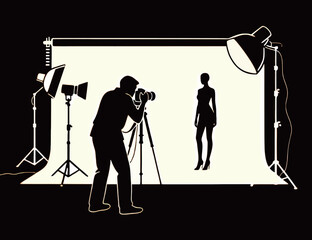 Silhouette of a photographer capturing a model on a well-lit studio backdrop.