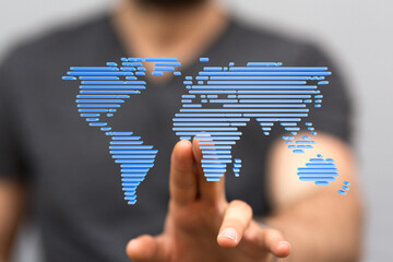 Person interacts with a digital world map, illustrating global connectivity and networking.