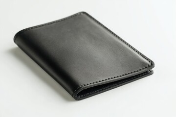 Black leather passport wallet, closed, on a white surface